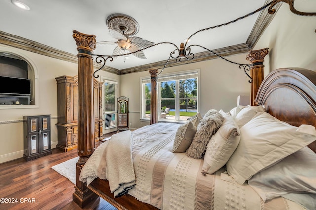 bedroom featuring crown molding, dark hardwood / wood-style flooring, and ornate columns