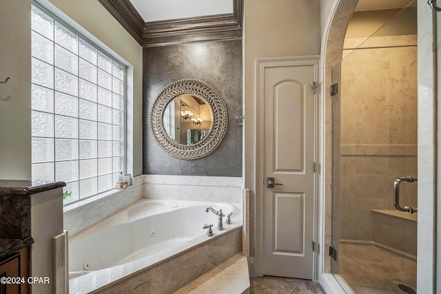 bathroom featuring plenty of natural light, vanity, crown molding, and separate shower and tub