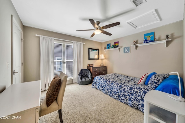 bedroom featuring ceiling fan and carpet floors