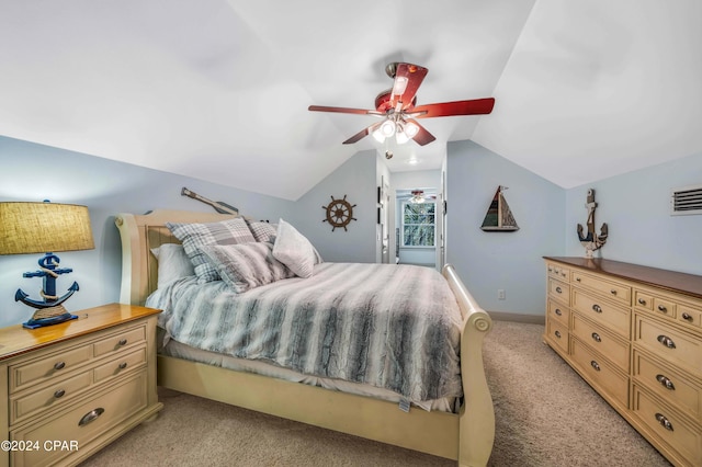 bedroom with lofted ceiling, light carpet, and ceiling fan