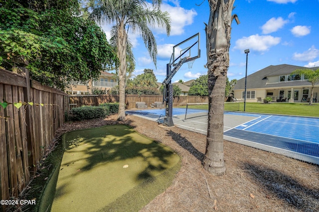 view of sport court with tennis court