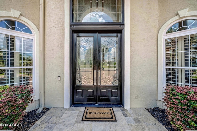 doorway to property with french doors