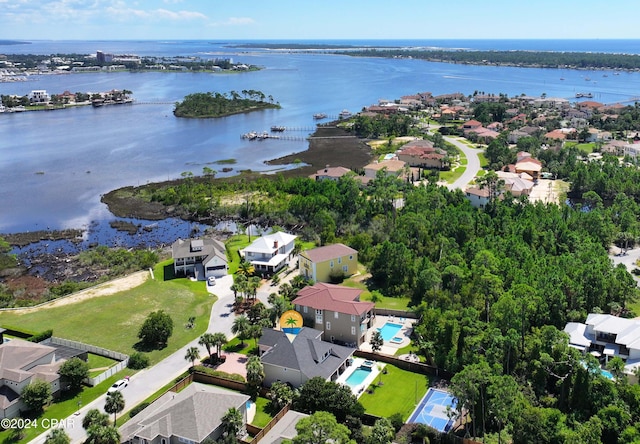 birds eye view of property with a water view