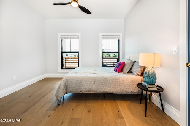 bedroom featuring ceiling fan and hardwood / wood-style flooring