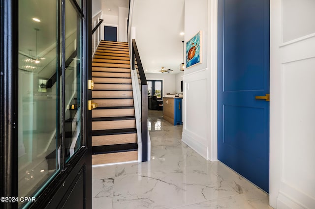 entryway with ceiling fan