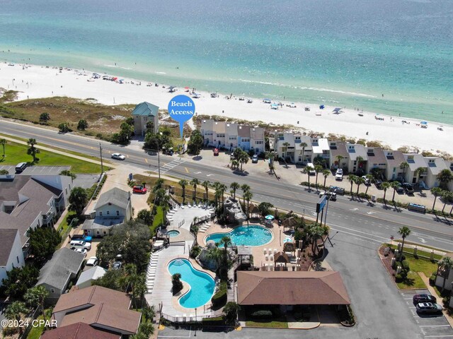 aerial view featuring a beach view and a water view