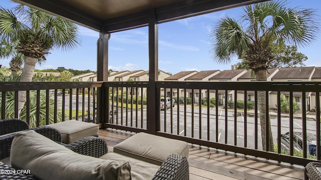 wooden deck with a residential view