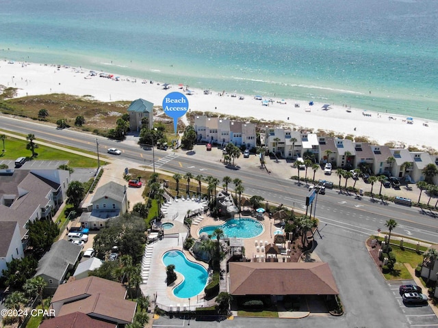 aerial view with a beach view and a water view