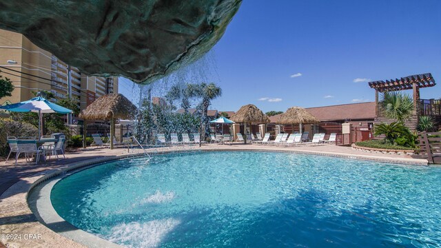 view of pool featuring a patio area