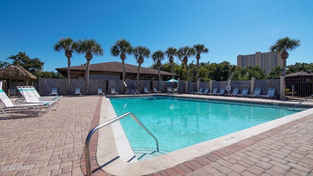 view of swimming pool featuring a patio