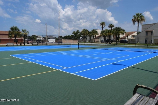 view of tennis court with basketball court