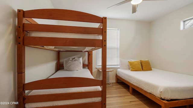 bedroom featuring light hardwood / wood-style floors and ceiling fan