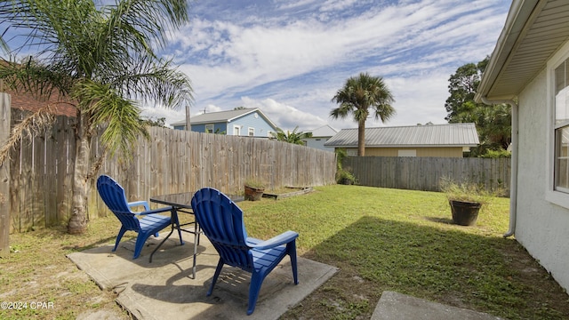 3809 Mystic St, Panama City, FL 32408 - view of yard featuring a fenced backyard and a patio area