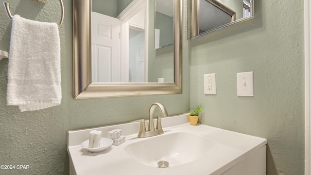 3809 Mystic St, Panama City, FL 32408 - bathroom featuring a textured wall and vanity