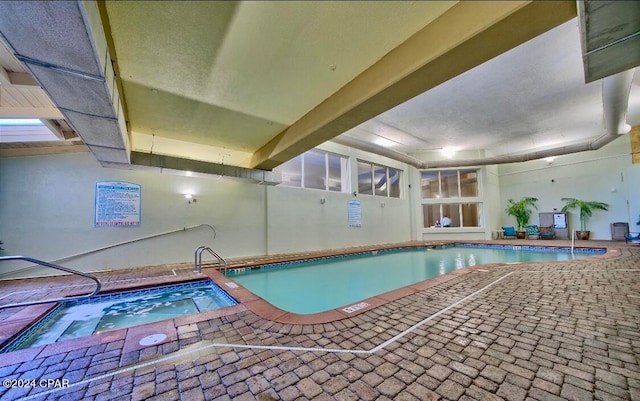 view of pool featuring an indoor in ground hot tub