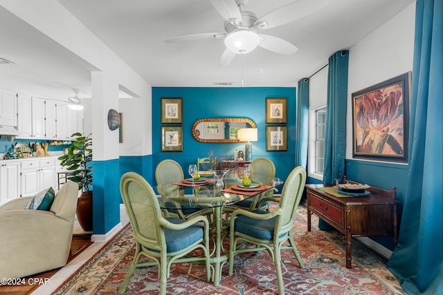 dining room with ceiling fan