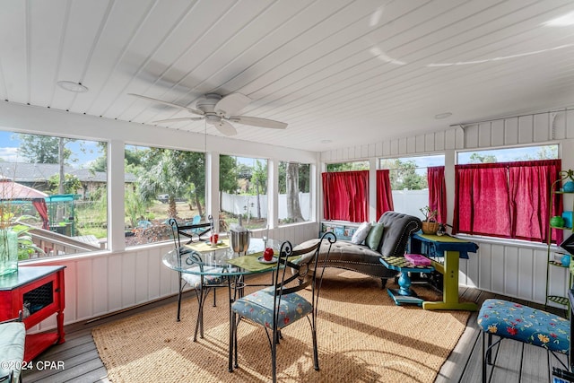 sunroom / solarium with ceiling fan