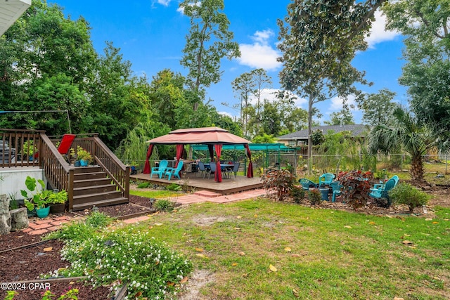 view of yard with a gazebo and a deck