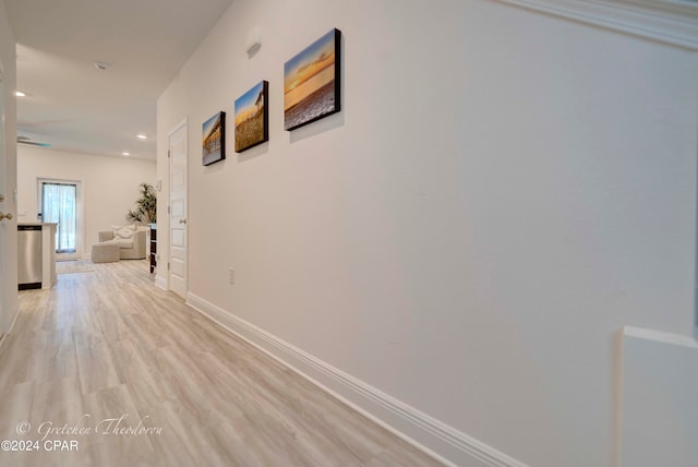 hallway with light wood-type flooring