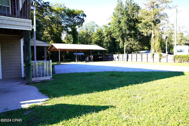 view of yard with a carport