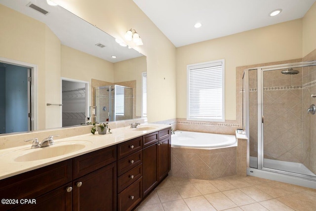 bathroom with vanity, separate shower and tub, and tile patterned floors