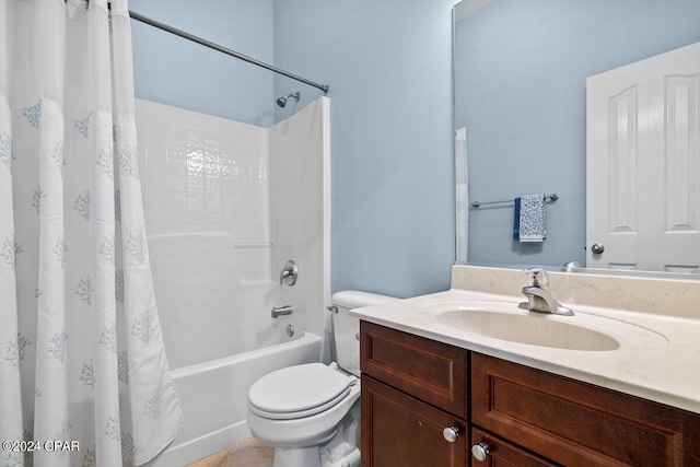 full bathroom with shower / bath combo, vanity, and toilet