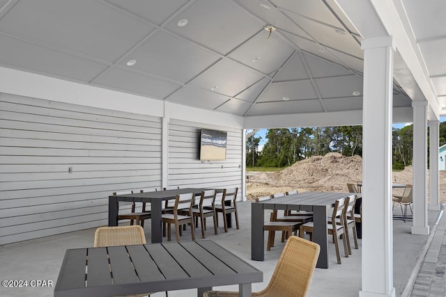 130 Canvas Ln Unit 69, Port St Joe, FL 32456 - wooden terrace featuring outdoor dining space and a patio area