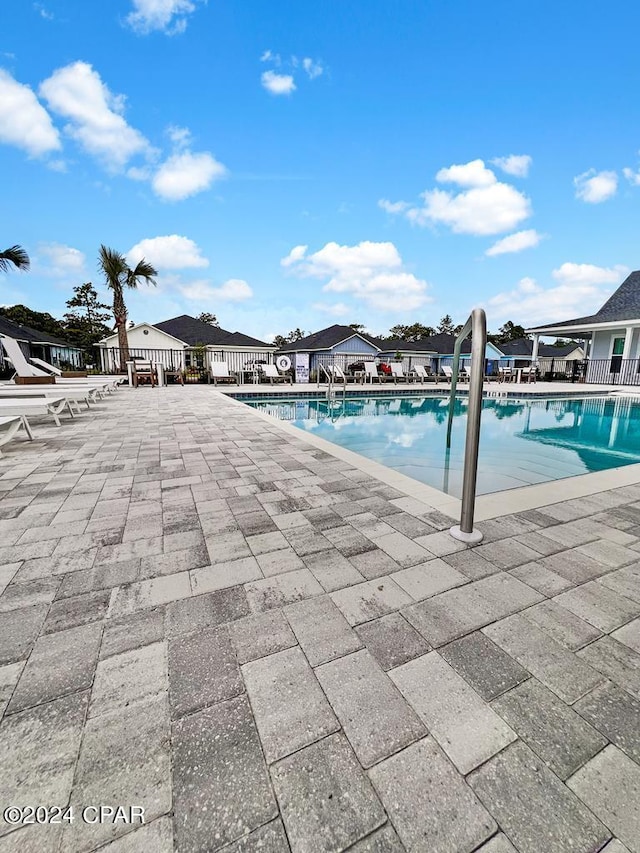 view of pool featuring a patio area