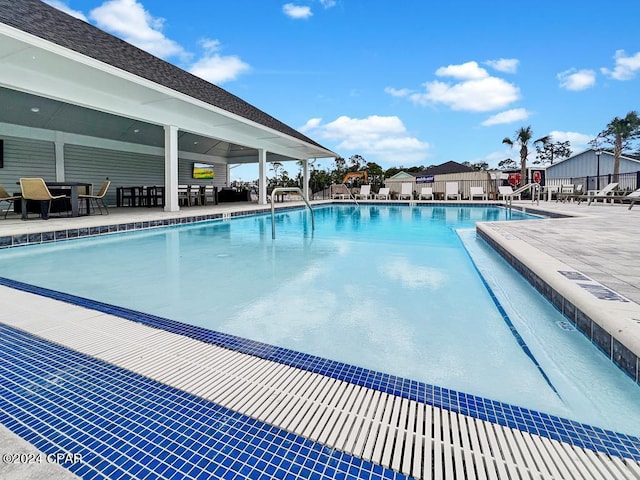 view of pool featuring a patio area