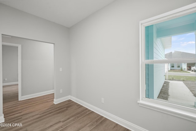 164 Canvas Ln Unit 72, Port St Joe, FL 32456 - unfurnished room with wood finished floors and baseboards