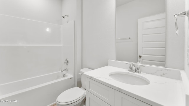 full bathroom featuring vanity, bathtub / shower combination, and toilet