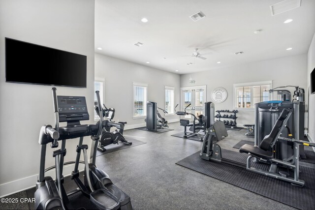 workout area featuring visible vents, baseboards, and recessed lighting