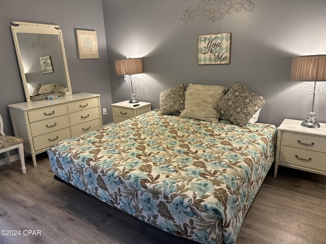 137 Gulf Highlands Blvd, Panama City Beach, FL 32407 - bedroom with dark wood-style flooring