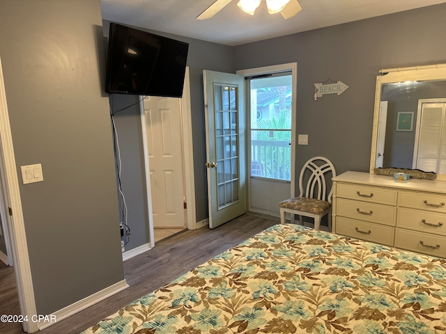 unfurnished bedroom featuring dark hardwood / wood-style floors and ceiling fan