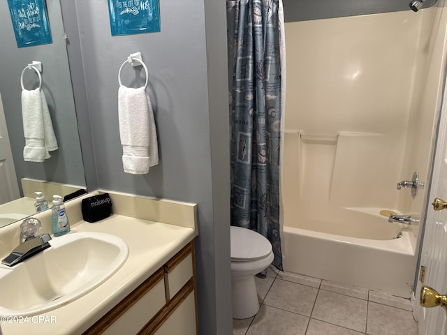 137 Gulf Highlands Blvd, Panama City Beach, FL 32407 - full bath with shower / bath combo, toilet, tile patterned flooring, and vanity