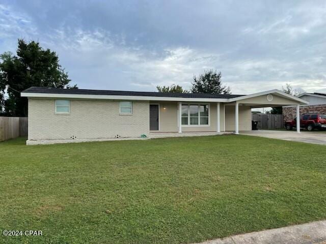 ranch-style house with a front yard