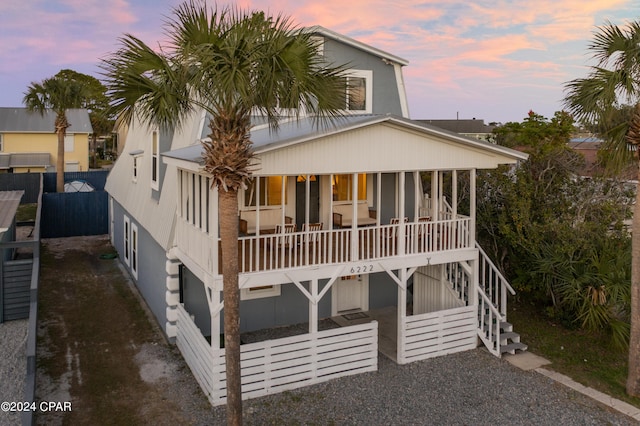 view of front of property featuring covered porch