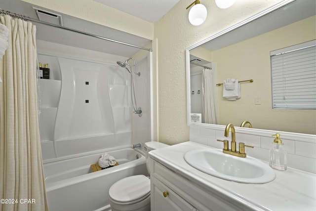 full bathroom with vanity, backsplash, toilet, and shower / bath combo with shower curtain