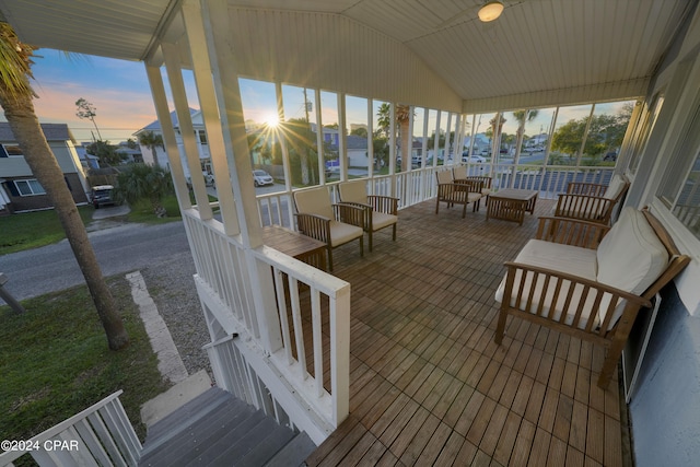 patio terrace at dusk with covered porch