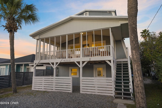 view of front of property with a balcony