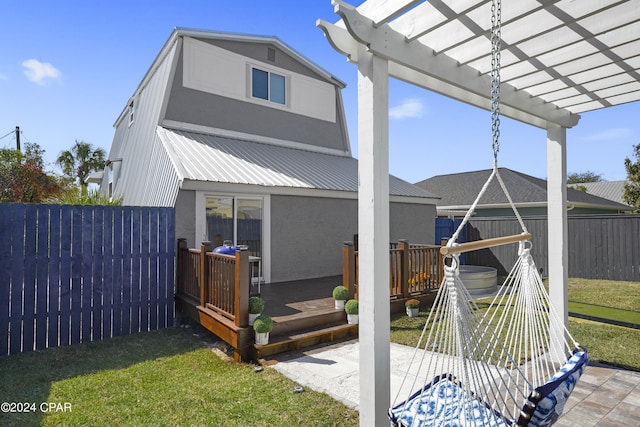 exterior space with a pergola, a yard, and a deck