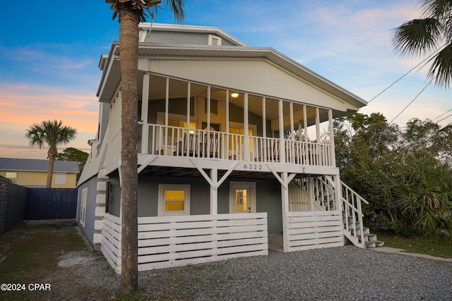 beach home featuring a balcony