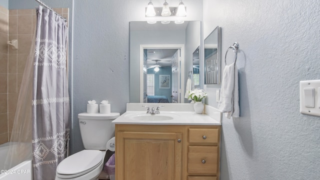 full bathroom featuring vanity, toilet, ceiling fan, and shower / bath combination with curtain