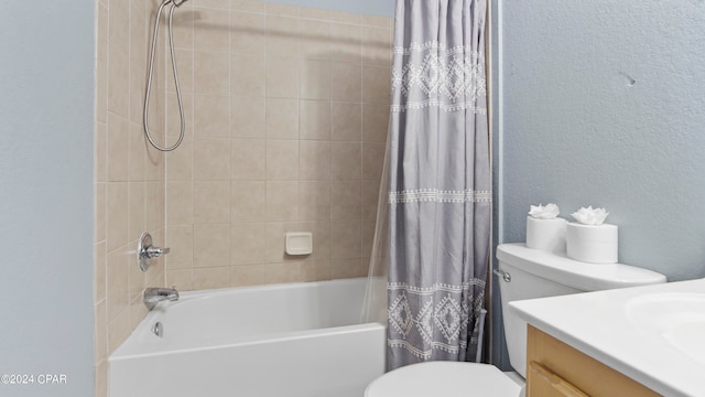 full bathroom featuring vanity, toilet, and shower / bath combo