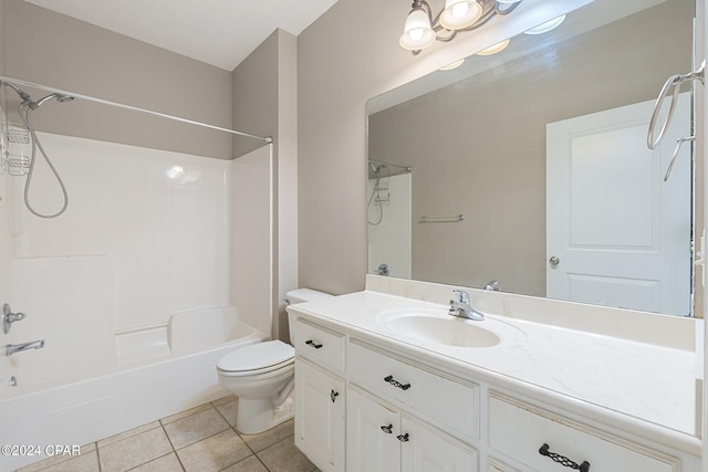1300 Alabama Ave, Lynn Haven, FL 32444 - full bathroom featuring tile patterned flooring, toilet, bathing tub / shower combination, and vanity