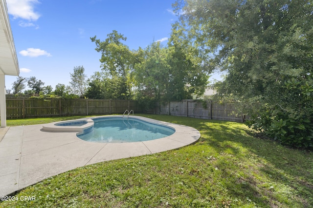 1300 Alabama Ave, Lynn Haven, FL 32444 - view of swimming pool with a patio and a pool with connected hot tub
