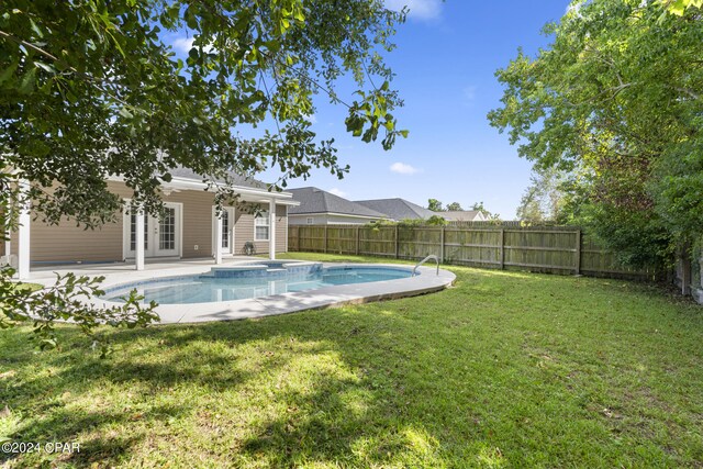 1300 Alabama Ave, Lynn Haven, FL 32444 - view of yard with french doors and a patio area