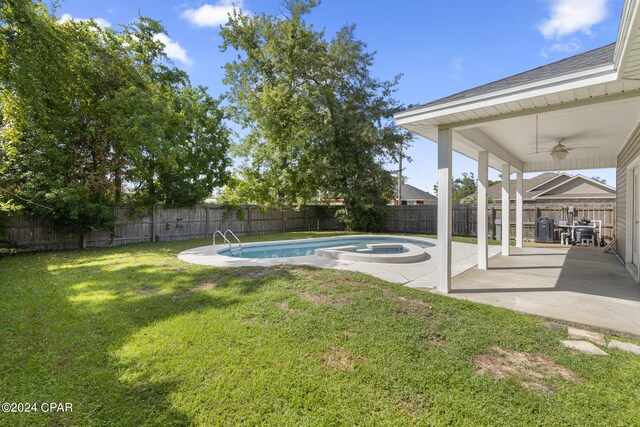 1300 Alabama Ave, Lynn Haven, FL 32444 - view of yard with a patio, ceiling fan, and an in-ground hot tub