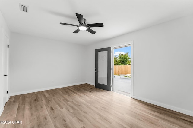 unfurnished room featuring ceiling fan and light hardwood / wood-style flooring