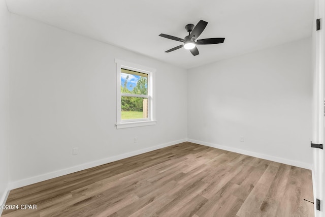 unfurnished room with light hardwood / wood-style floors and ceiling fan